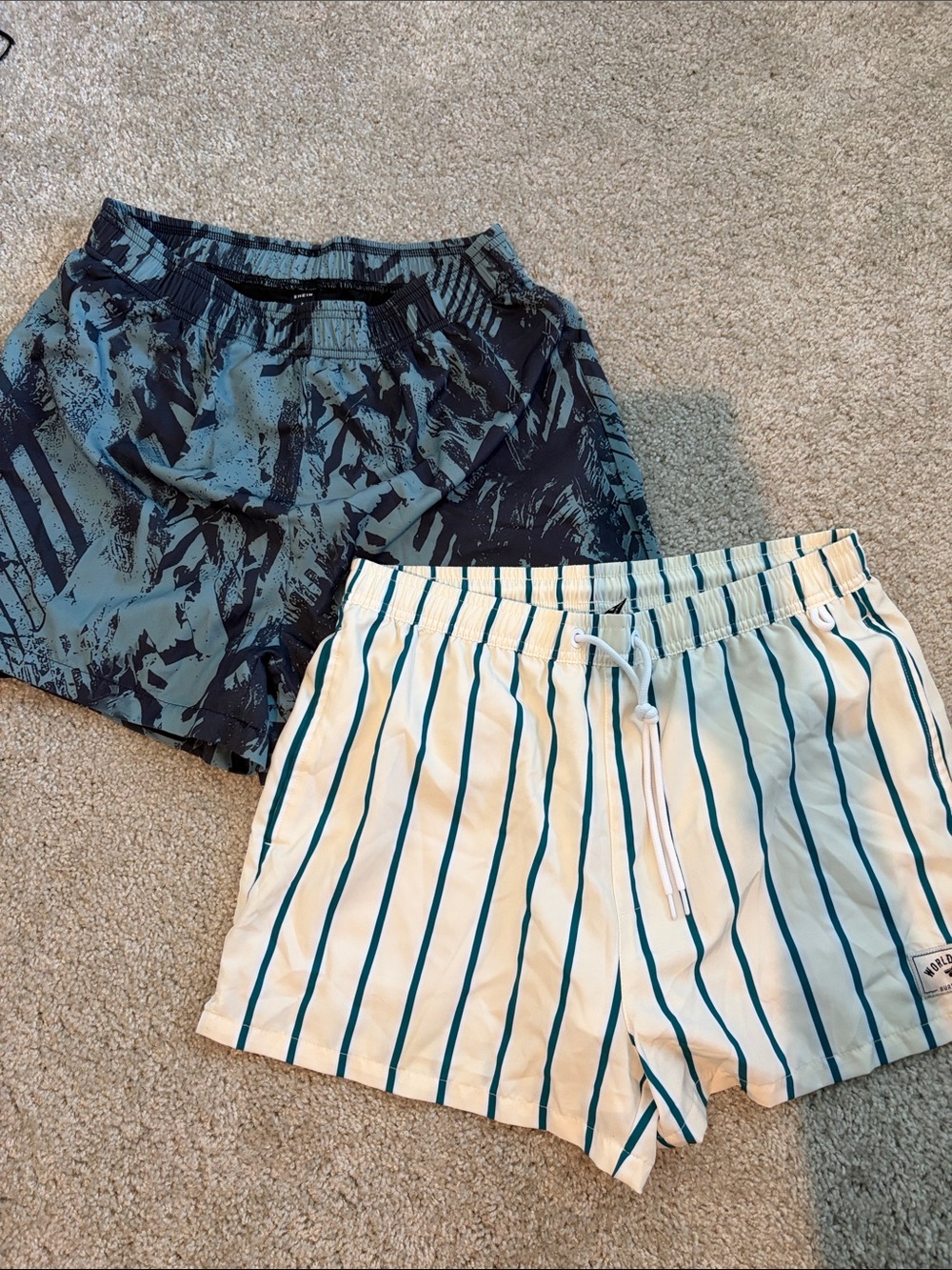 Two pair of athletic shorts with linings
